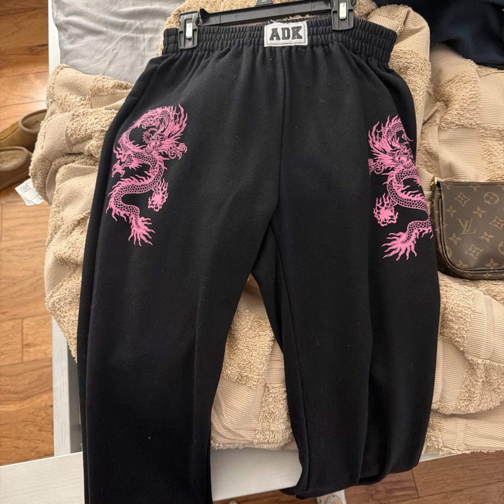 Adika Kids Black Joggers with Pink Dragon Design